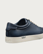 Berluti Playtime sneakers feature navy blue Venezia leather and signature hand
